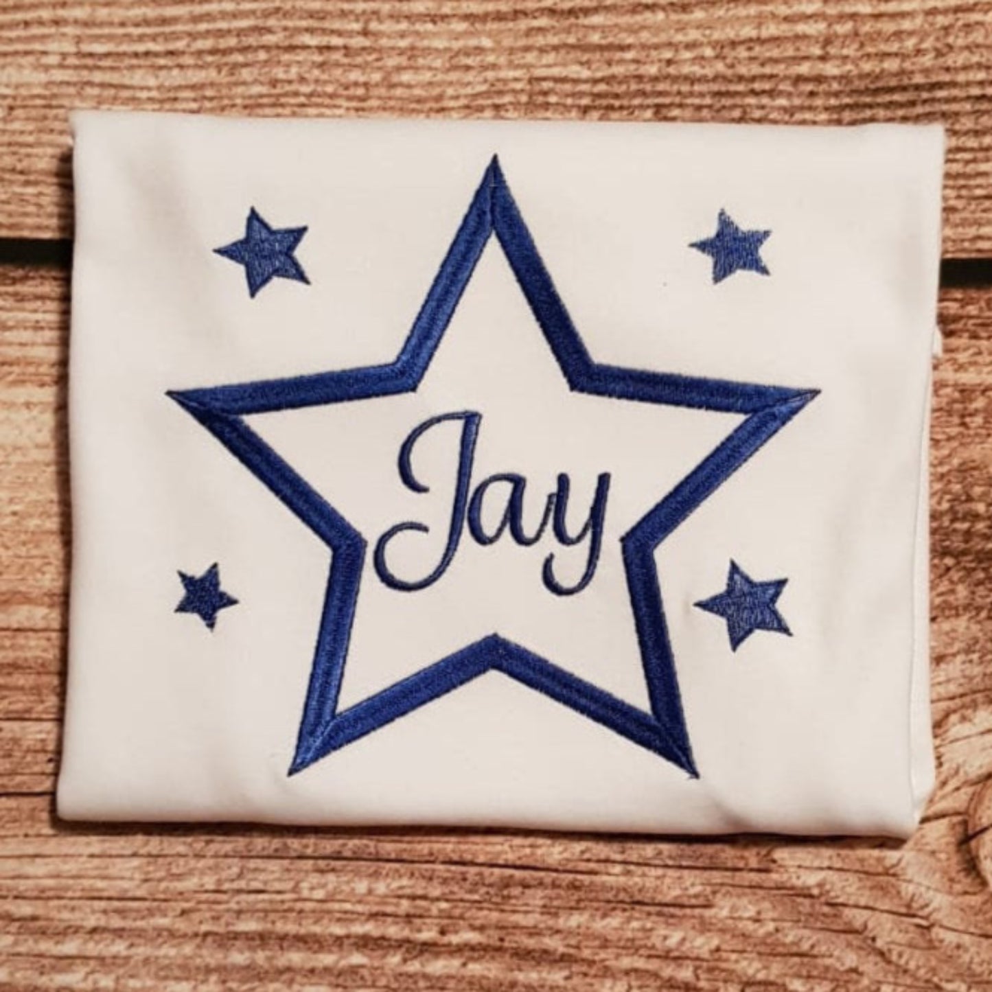 childrens embroidered star tshirt with name or initials in the middle