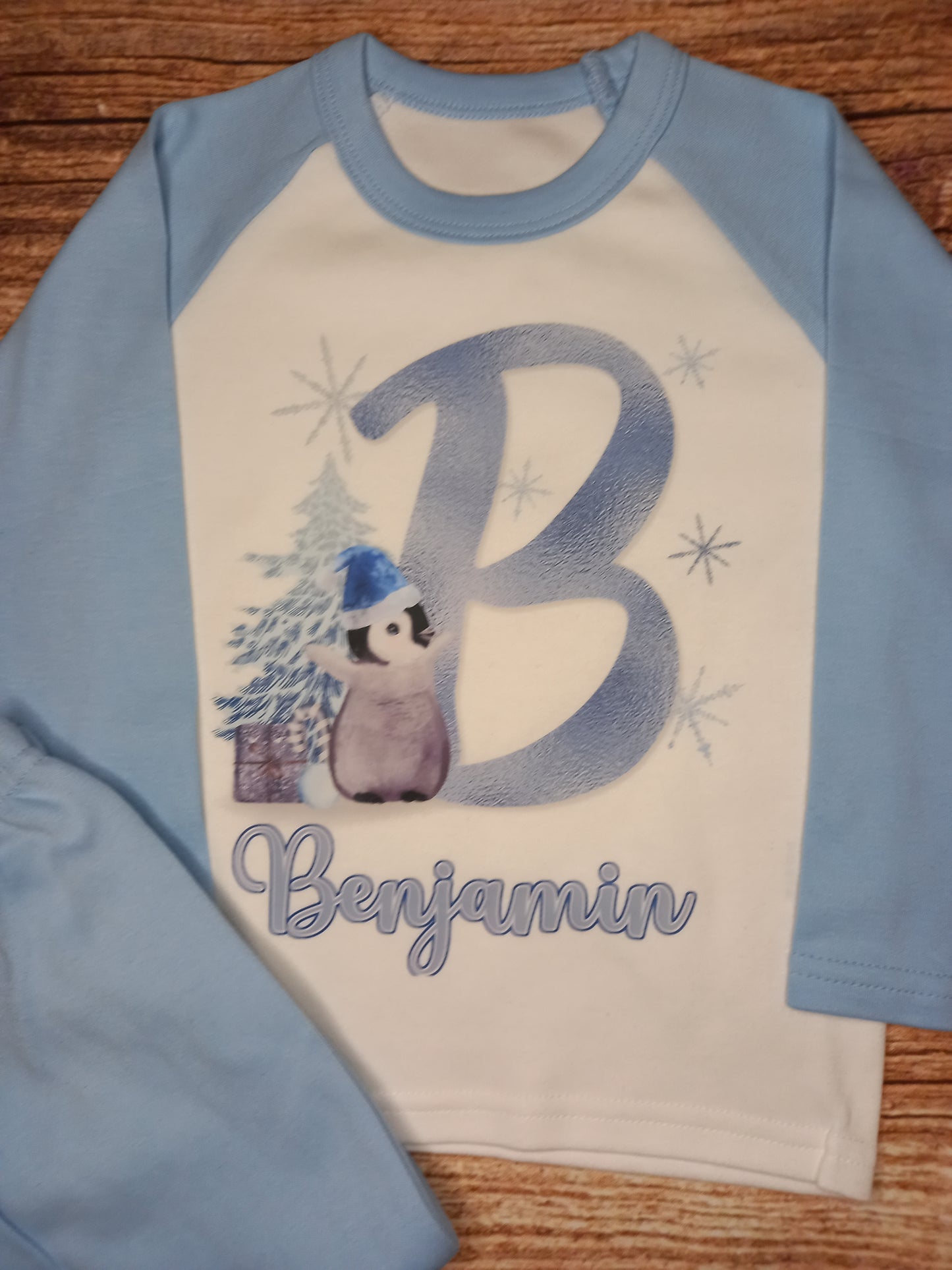 Children's personalised Christmas pyjamas, Kids festive pjs, Blue Penguin initial nightwear
