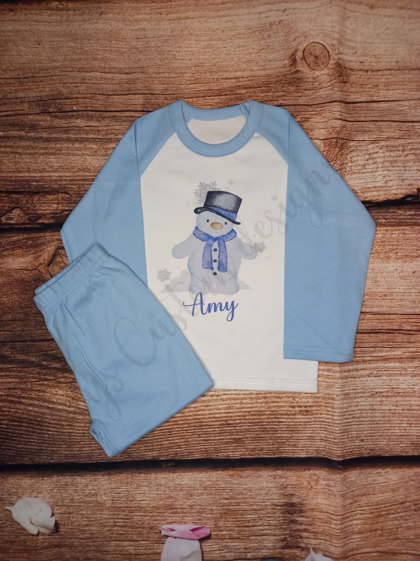 Children's personalised Christmas pyjamas, kids snowman pjs, festive sleepwear