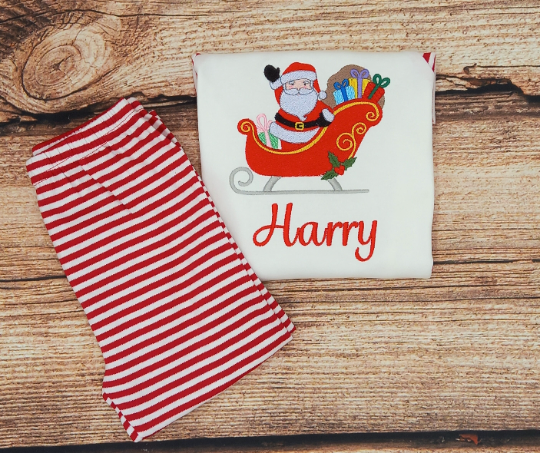 Childrens personalised Christmas pjs, Santa on his sleigh kids xmas pyjamas, family matching pjs