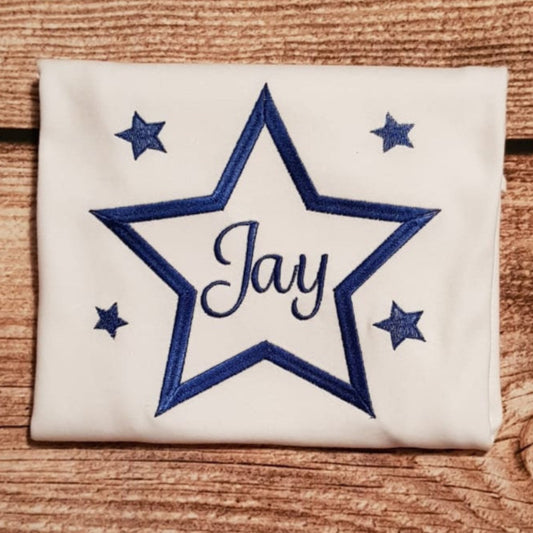 childrens embroidered star tshirt with name or initials in the middle