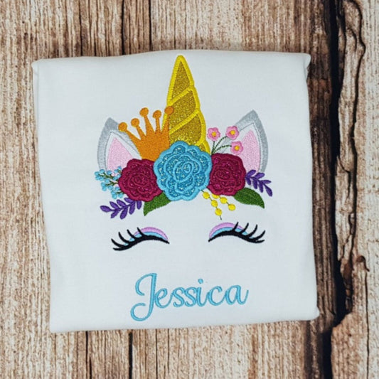 Childrens personalised unicorn tshirt, childs embroidered unicorn wearing a crown top shirt