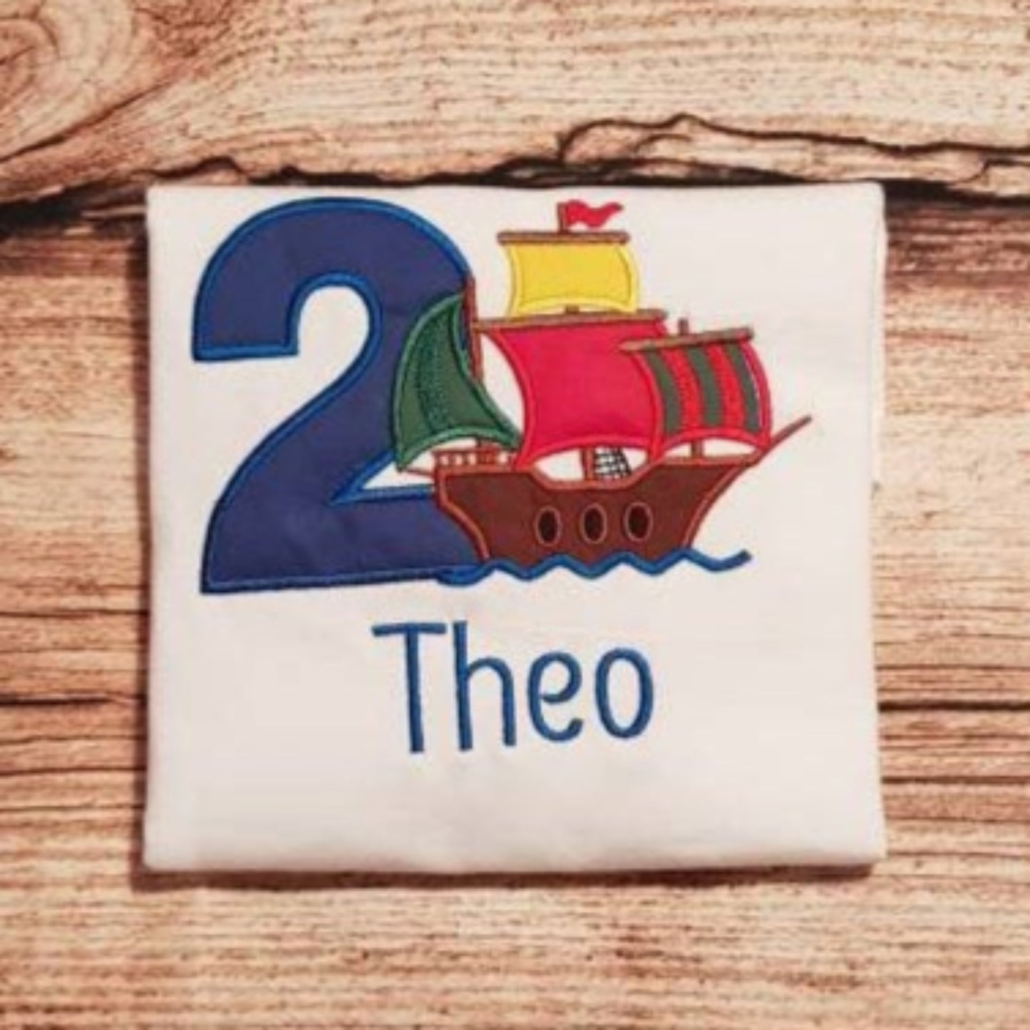 Chilldrens personalised pirate ship birthday tshirt, childs embroidered birthday shirt