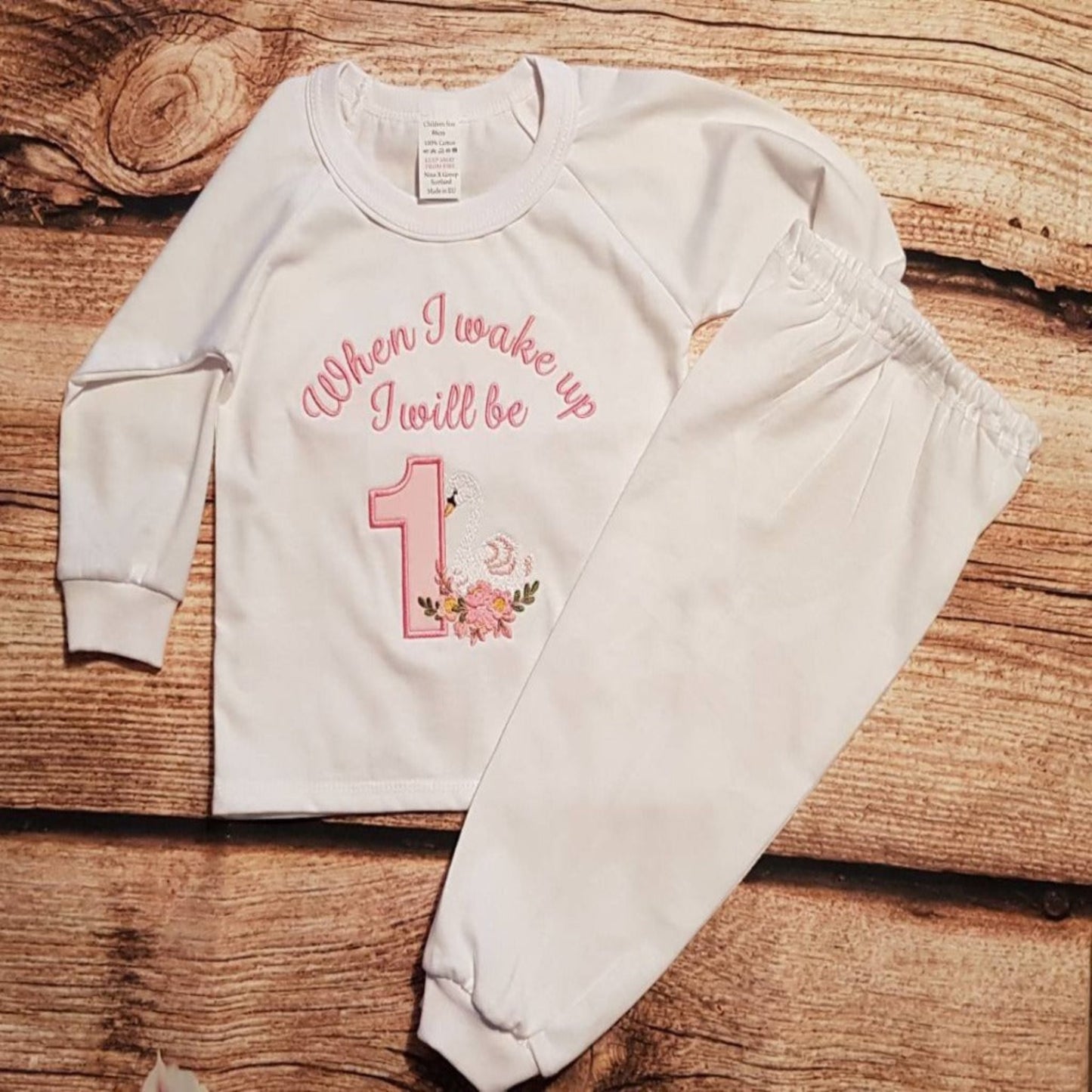 childrens personalised birthday pjs, childs embroidered swan pyjamas