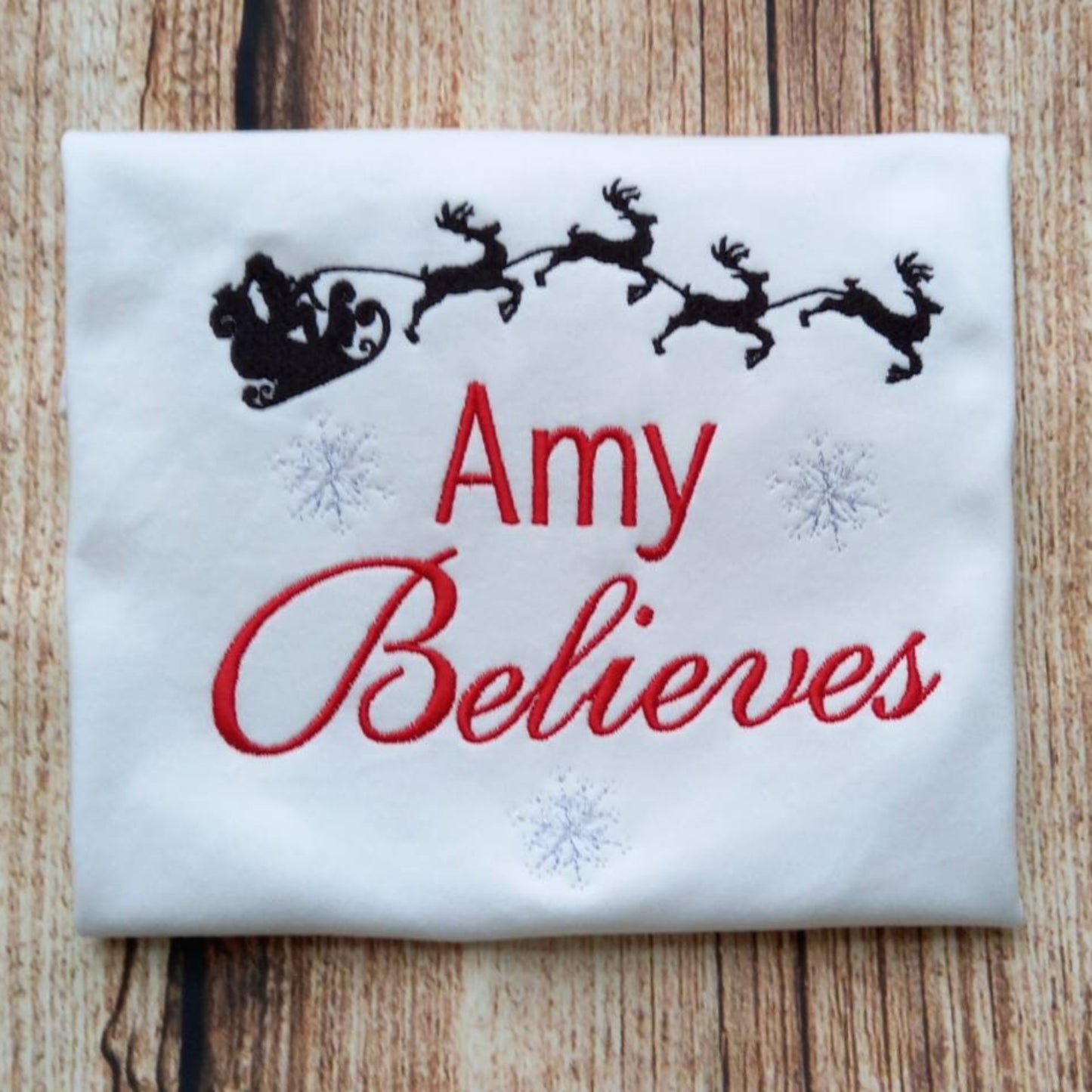 Childrens personalised Christmas tshirt, Childs xmas shirt, festive clothing, Believe in christmas embroidered top, gift for kids, santa tee
