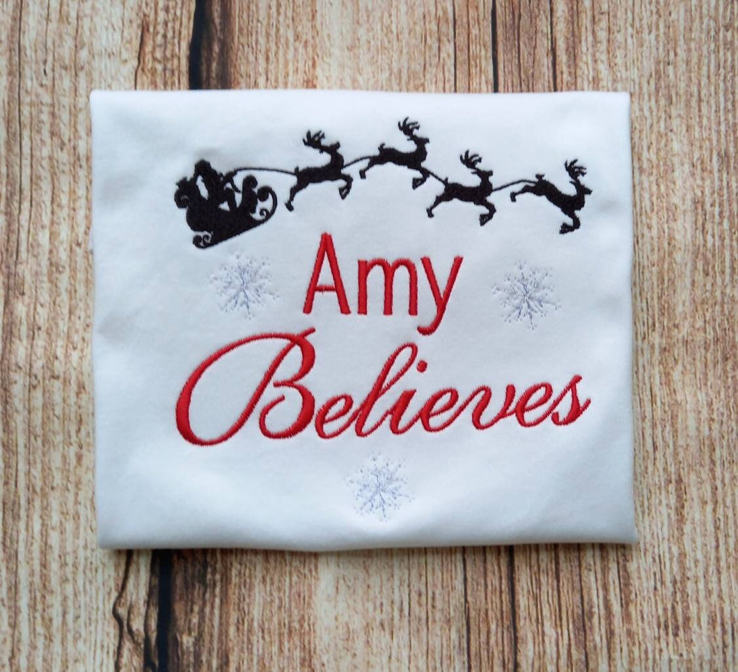 Childrens personalised Christmas tshirt, Childs xmas shirt, festive clothing, Believe in christmas embroidered top, gift for kids, santa tee