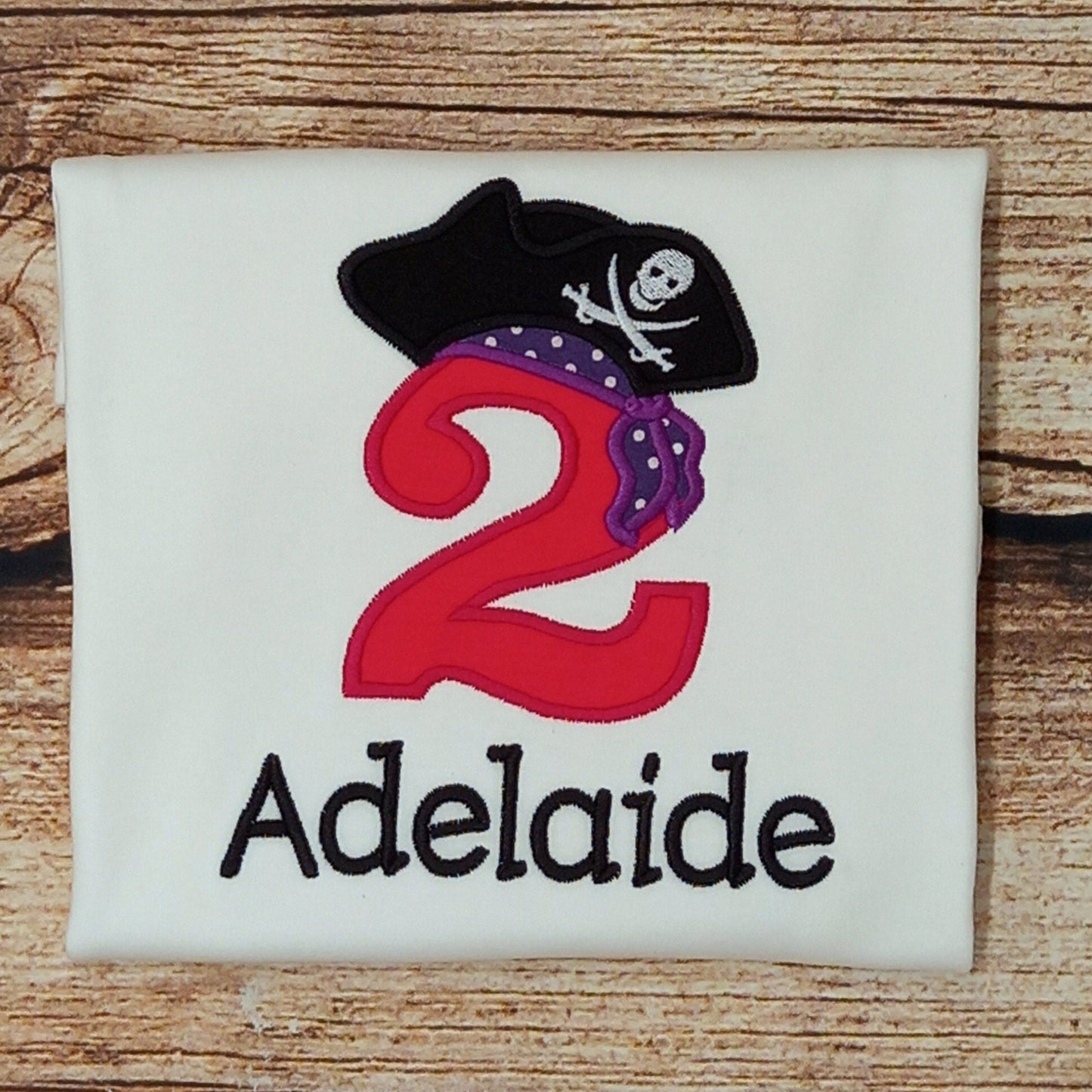 Childrens personalised birthday tshirt, Childs pirate t-shirt, kids embroidered birthday shirt, personalised gift, pink/purple pirate top