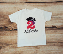 Load image into Gallery viewer, Childrens personalised birthday tshirt, Childs pirate t-shirt, kids embroidered birthday shirt, personalised gift, pink/purple pirate top
