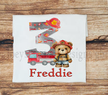 Load image into Gallery viewer, Childrens personalised birthday tshirt, Kids fire engine birthday top, Childs fireman teddy birthday tee, fireman theme birthday clothes
